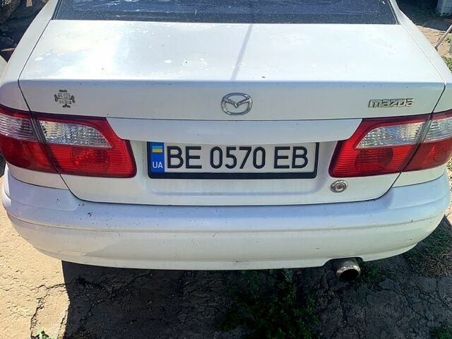 Белый Мазда 626, объемом двигателя 1.8 л и пробегом 292 тыс. км за 3200 $, фото 5 на Automoto.ua