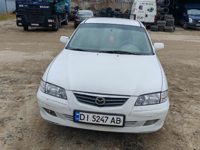 Белый Мазда 626, объемом двигателя 2 л и пробегом 300 тыс. км за 1800 $, фото 1 на Automoto.ua