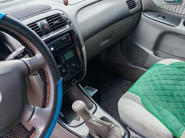 Белый Мазда 626, объемом двигателя 2 л и пробегом 300 тыс. км за 1800 $, фото 6 на Automoto.ua