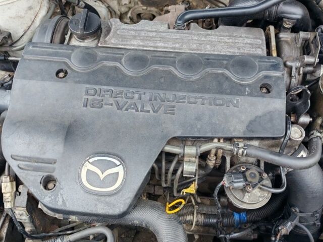 Белый Мазда 626, объемом двигателя 2 л и пробегом 300 тыс. км за 1800 $, фото 9 на Automoto.ua