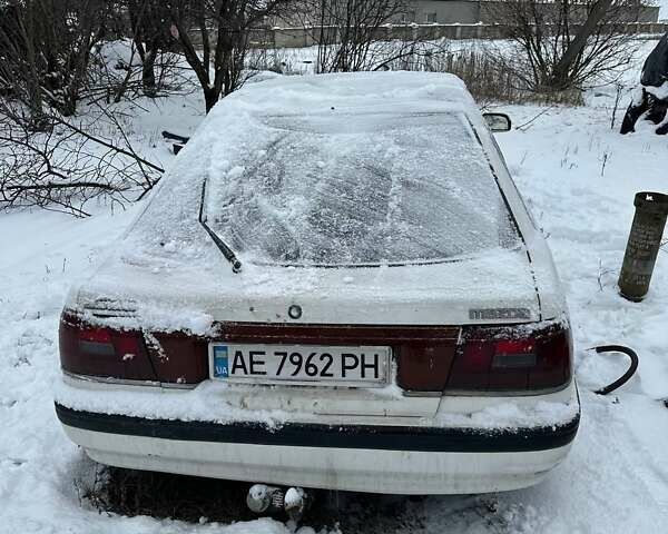 Белый Мазда 626, объемом двигателя 2 л и пробегом 1000 тыс. км за 520 $, фото 2 на Automoto.ua