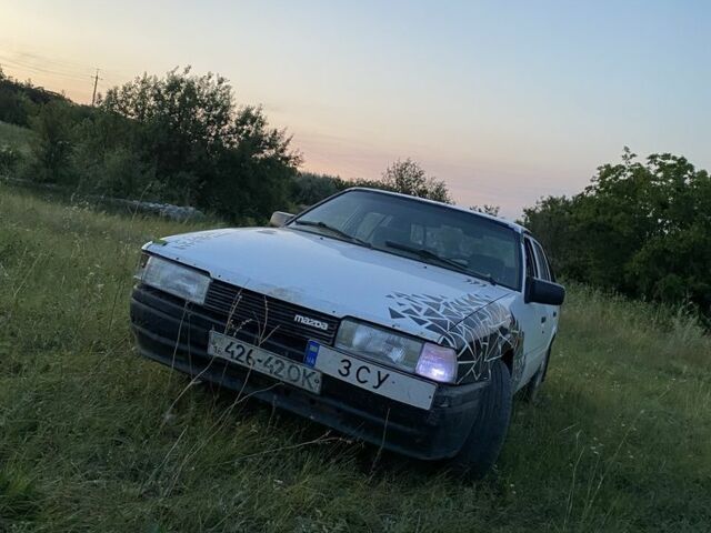 Білий Мазда 626, об'ємом двигуна 2 л та пробігом 400 тис. км за 560 $, фото 5 на Automoto.ua