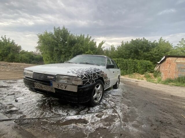 Білий Мазда 626, об'ємом двигуна 2 л та пробігом 400 тис. км за 560 $, фото 4 на Automoto.ua