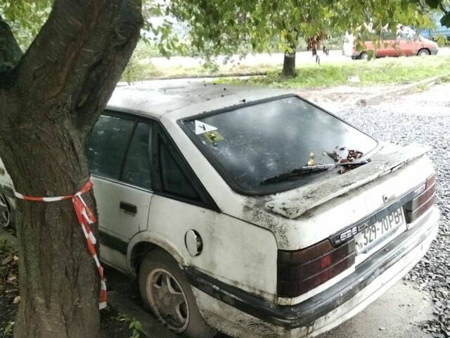 Белый Мазда 626, объемом двигателя 0 л и пробегом 400 тыс. км за 250 $, фото 2 на Automoto.ua