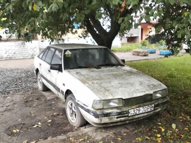 Белый Мазда 626, объемом двигателя 0 л и пробегом 400 тыс. км за 250 $, фото 4 на Automoto.ua