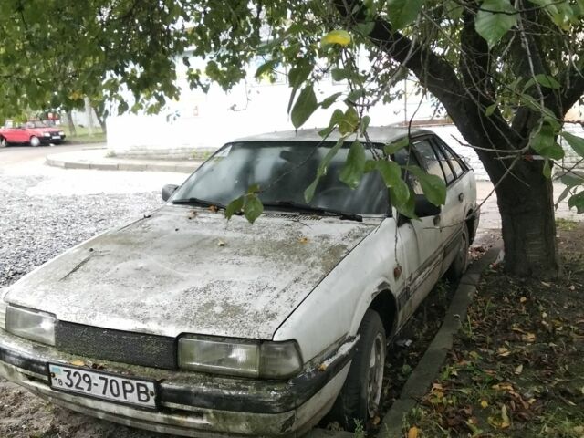 Белый Мазда 626, объемом двигателя 0 л и пробегом 400 тыс. км за 250 $, фото 3 на Automoto.ua