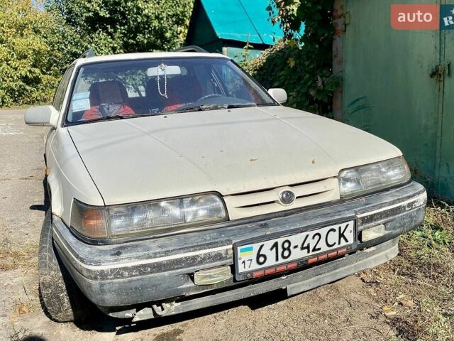 Белый Мазда 626, объемом двигателя 2 л и пробегом 194 тыс. км за 1300 $, фото 2 на Automoto.ua