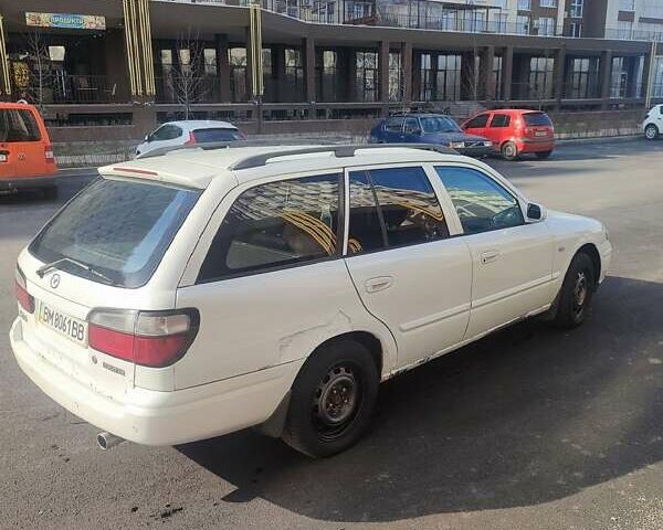 Белый Мазда 626, объемом двигателя 2 л и пробегом 610 тыс. км за 1750 $, фото 10 на Automoto.ua