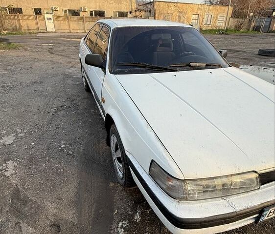 Білий Мазда 626, об'ємом двигуна 2 л та пробігом 225 тис. км за 1100 $, фото 1 на Automoto.ua