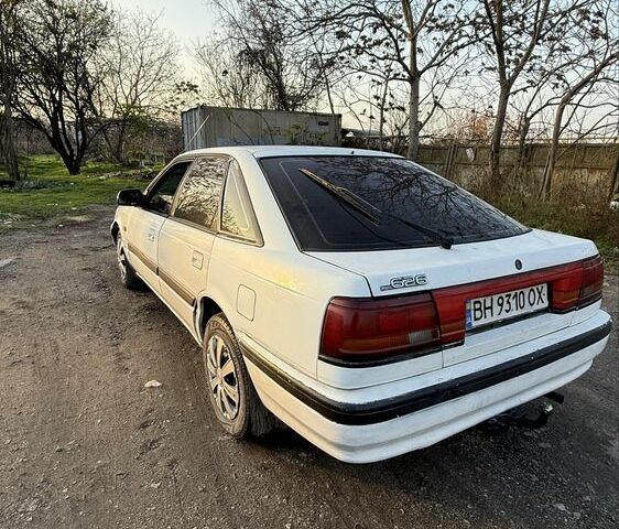 Білий Мазда 626, об'ємом двигуна 2 л та пробігом 225 тис. км за 1100 $, фото 5 на Automoto.ua