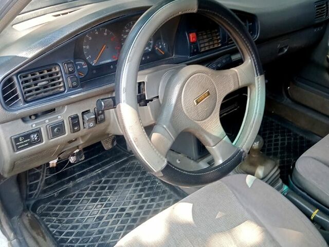 Білий Мазда 626, об'ємом двигуна 2 л та пробігом 111 тис. км за 1350 $, фото 3 на Automoto.ua