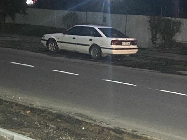 Белый Мазда 626, объемом двигателя 2 л и пробегом 255 тыс. км за 1100 $, фото 4 на Automoto.ua