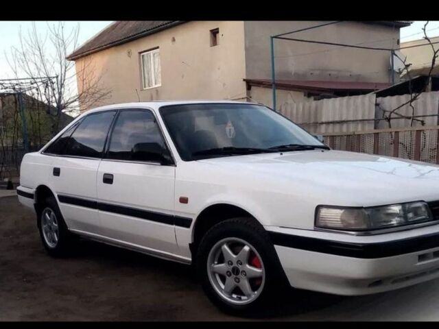 Белый Мазда 626, объемом двигателя 2 л и пробегом 255 тыс. км за 1100 $, фото 2 на Automoto.ua