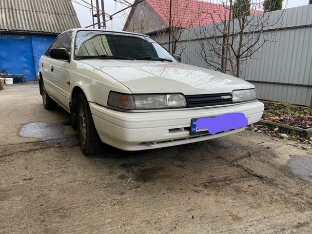 Белый Мазда 626, объемом двигателя 2 л и пробегом 356 тыс. км за 2200 $, фото 2 на Automoto.ua