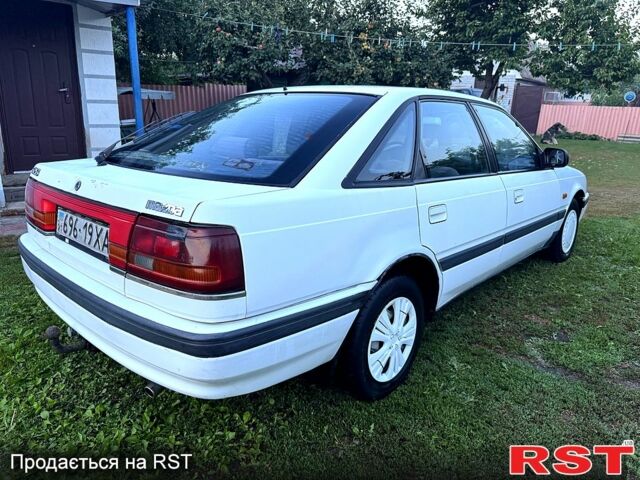Белый Мазда 626, объемом двигателя 2 л и пробегом 506 тыс. км за 850 $, фото 5 на Automoto.ua