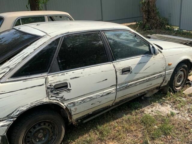 Белый Мазда 626, объемом двигателя 2 л и пробегом 300 тыс. км за 523 $, фото 4 на Automoto.ua