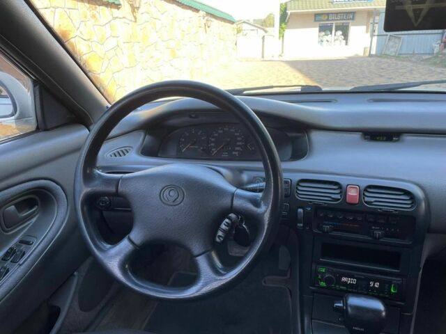 Белый Мазда 626, объемом двигателя 2 л и пробегом 146 тыс. км за 2250 $, фото 10 на Automoto.ua