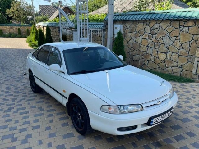 Белый Мазда 626, объемом двигателя 2 л и пробегом 146 тыс. км за 2250 $, фото 1 на Automoto.ua