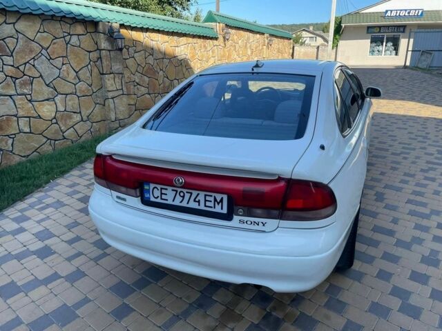 Белый Мазда 626, объемом двигателя 2 л и пробегом 146 тыс. км за 2250 $, фото 20 на Automoto.ua