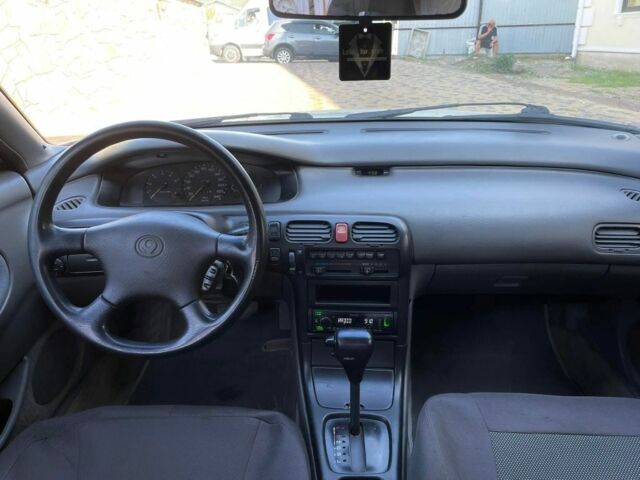 Белый Мазда 626, объемом двигателя 2 л и пробегом 146 тыс. км за 2250 $, фото 9 на Automoto.ua