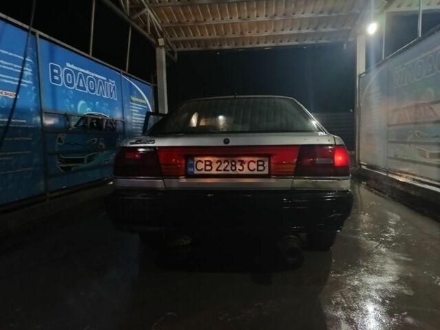 Бежевый Мазда 626, объемом двигателя 2 л и пробегом 460 тыс. км за 426 $, фото 7 на Automoto.ua