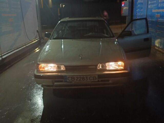 Бежевый Мазда 626, объемом двигателя 2 л и пробегом 460 тыс. км за 426 $, фото 5 на Automoto.ua