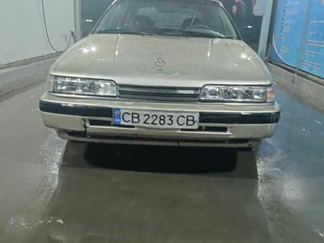 Бежевый Мазда 626, объемом двигателя 2 л и пробегом 460 тыс. км за 426 $, фото 8 на Automoto.ua