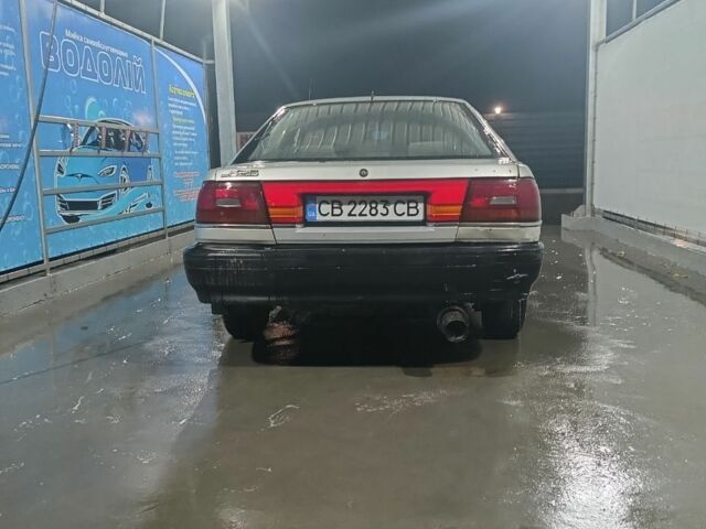 Бежевый Мазда 626, объемом двигателя 2 л и пробегом 460 тыс. км за 426 $, фото 6 на Automoto.ua