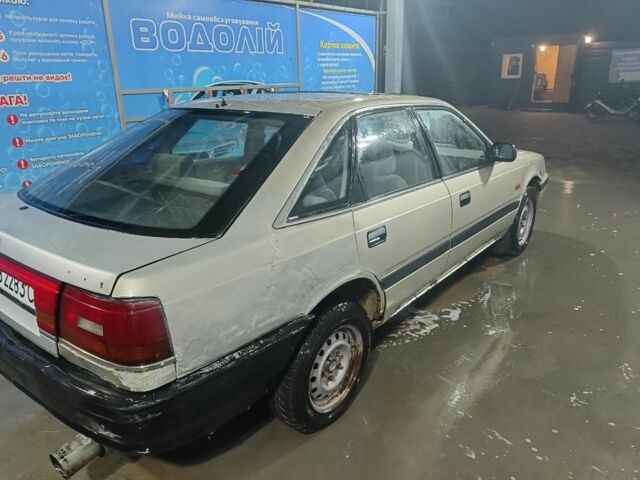 Бежевый Мазда 626, объемом двигателя 2 л и пробегом 460 тыс. км за 426 $, фото 3 на Automoto.ua