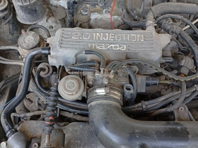 Бежевый Мазда 626, объемом двигателя 2 л и пробегом 200 тыс. км за 850 $, фото 6 на Automoto.ua