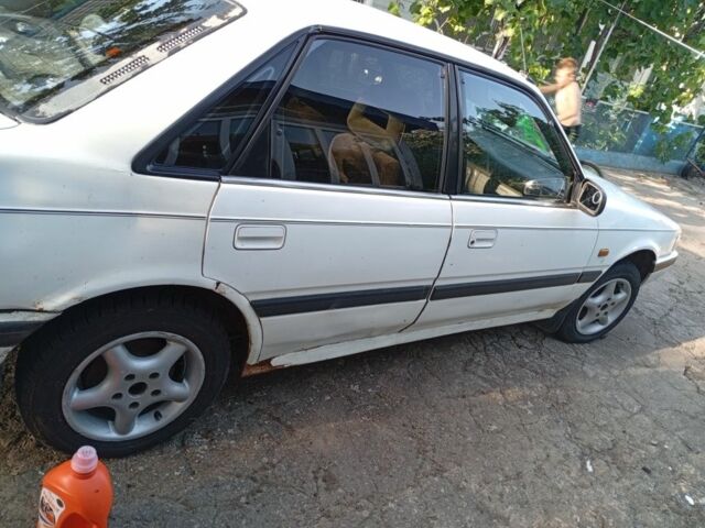 Бежевый Мазда 626, объемом двигателя 2 л и пробегом 200 тыс. км за 850 $, фото 2 на Automoto.ua