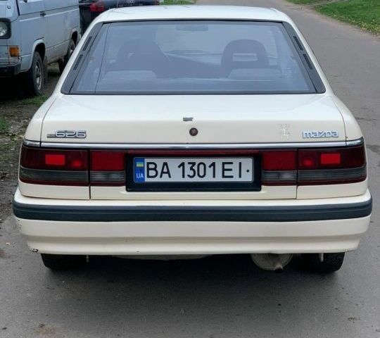 Бежевый Мазда 626, объемом двигателя 2 л и пробегом 210 тыс. км за 1800 $, фото 7 на Automoto.ua