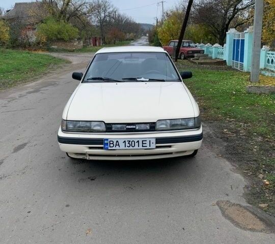 Бежевый Мазда 626, объемом двигателя 2 л и пробегом 210 тыс. км за 1800 $, фото 6 на Automoto.ua