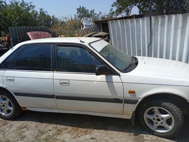 Бежевый Мазда 626, объемом двигателя 2 л и пробегом 200 тыс. км за 850 $, фото 8 на Automoto.ua