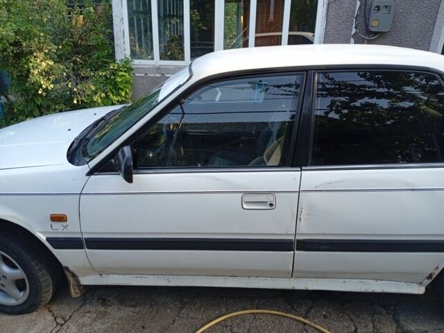 Бежевый Мазда 626, объемом двигателя 2 л и пробегом 200 тыс. км за 850 $, фото 4 на Automoto.ua