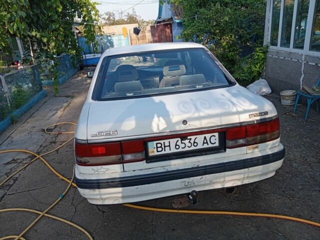 Бежевый Мазда 626, объемом двигателя 2 л и пробегом 200 тыс. км за 850 $, фото 3 на Automoto.ua