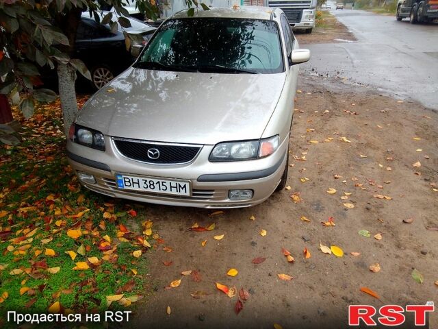Бежевий Мазда 626, об'ємом двигуна 2 л та пробігом 277 тис. км за 2450 $, фото 2 на Automoto.ua