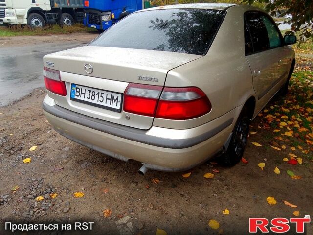 Бежевий Мазда 626, об'ємом двигуна 2 л та пробігом 277 тис. км за 2450 $, фото 1 на Automoto.ua