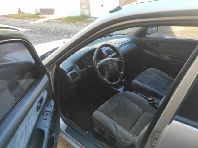 Бежевый Мазда 626, объемом двигателя 1.8 л и пробегом 249 тыс. км за 1450 $, фото 6 на Automoto.ua