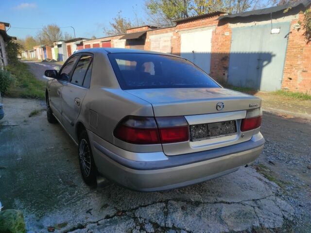 Бежевый Мазда 626, объемом двигателя 1.8 л и пробегом 249 тыс. км за 1450 $, фото 4 на Automoto.ua