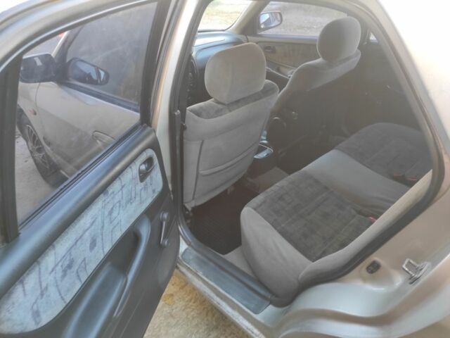 Бежевый Мазда 626, объемом двигателя 1.8 л и пробегом 249 тыс. км за 1450 $, фото 7 на Automoto.ua