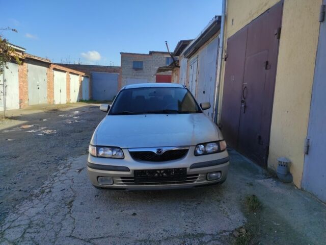 Бежевый Мазда 626, объемом двигателя 1.8 л и пробегом 249 тыс. км за 1450 $, фото 5 на Automoto.ua