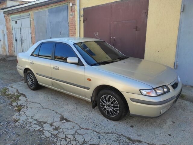 Бежевый Мазда 626, объемом двигателя 1.8 л и пробегом 249 тыс. км за 1450 $, фото 2 на Automoto.ua