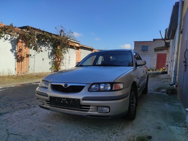 Бежевый Мазда 626, объемом двигателя 1.8 л и пробегом 249 тыс. км за 1450 $, фото 1 на Automoto.ua