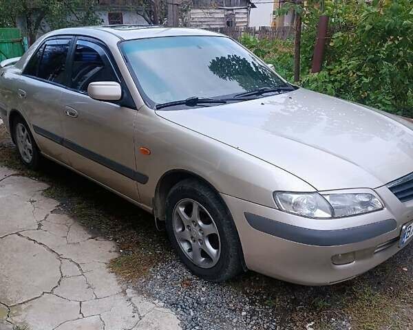 Бежевый Мазда 626, объемом двигателя 2 л и пробегом 290 тыс. км за 3500 $, фото 1 на Automoto.ua