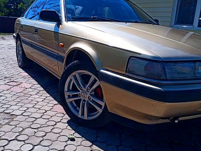 Бежевый Мазда 626, объемом двигателя 2 л и пробегом 500 тыс. км за 1150 $, фото 10 на Automoto.ua