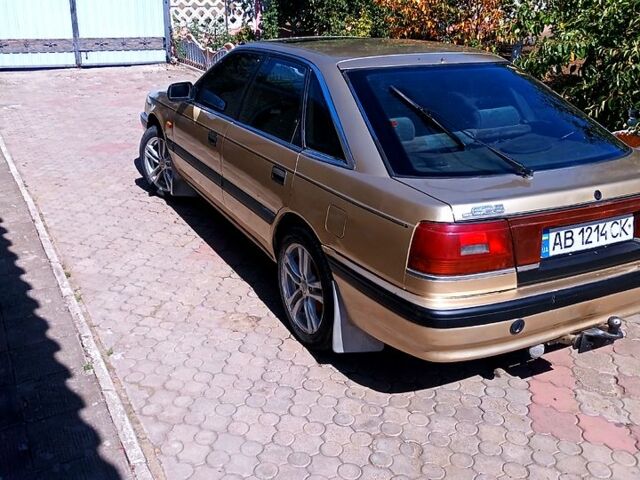 Бежевый Мазда 626, объемом двигателя 2 л и пробегом 500 тыс. км за 1150 $, фото 1 на Automoto.ua