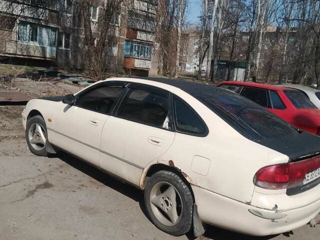 Бежевий Мазда 626, об'ємом двигуна 1.8 л та пробігом 400 тис. км за 639 $, фото 1 на Automoto.ua