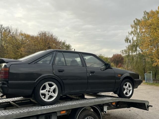 Чорний Мазда 626, об'ємом двигуна 2 л та пробігом 380 тис. км за 550 $, фото 2 на Automoto.ua