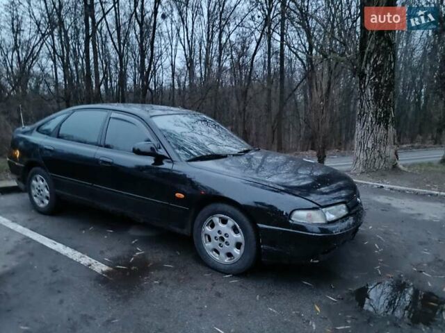 Черный Мазда 626, объемом двигателя 2.5 л и пробегом 480 тыс. км за 1400 $, фото 4 на Automoto.ua